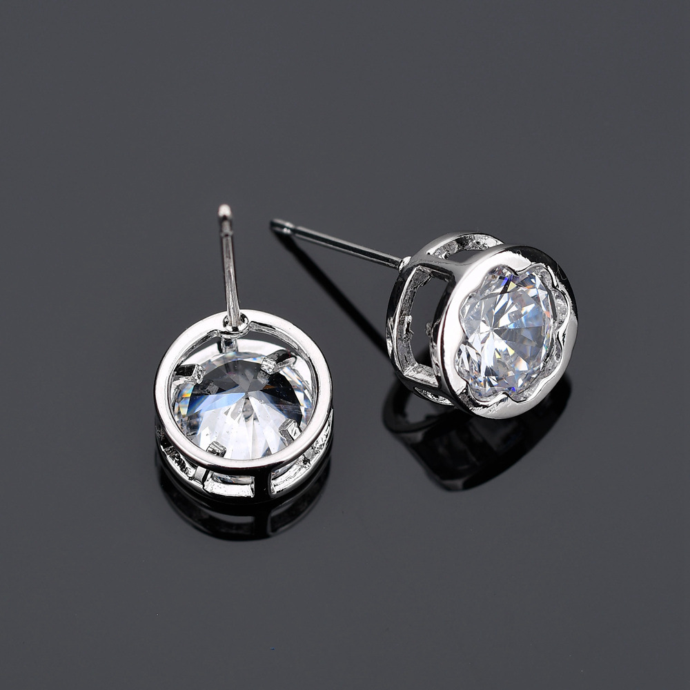 Lucky flower stud earrings set with garnet red zircon plated platinum, cross-border jewelry, simple and versatile stud earrings