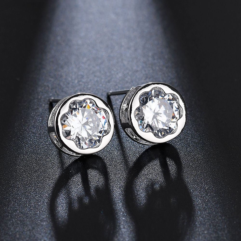 Lucky flower stud earrings set with garnet red zircon plated platinum, cross-border jewelry, simple and versatile stud earrings detail image 4