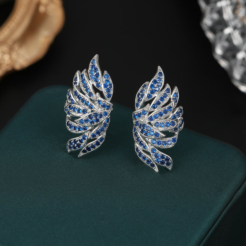 The 2022 new trendy earrings feature a light luxury and fashionable design with zircon inlays, creative feather wings, and no ear piercings or ear bone clips detail image 3