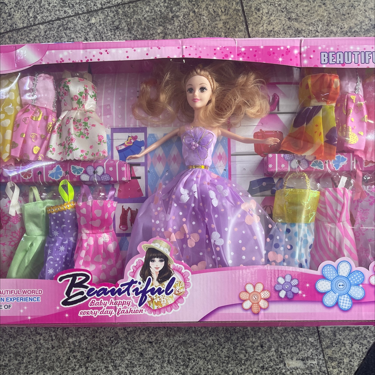 New set of doll accessories and clothes. The doll has a solid body. The hair is loose. Mix the colors of the clothes Specification image