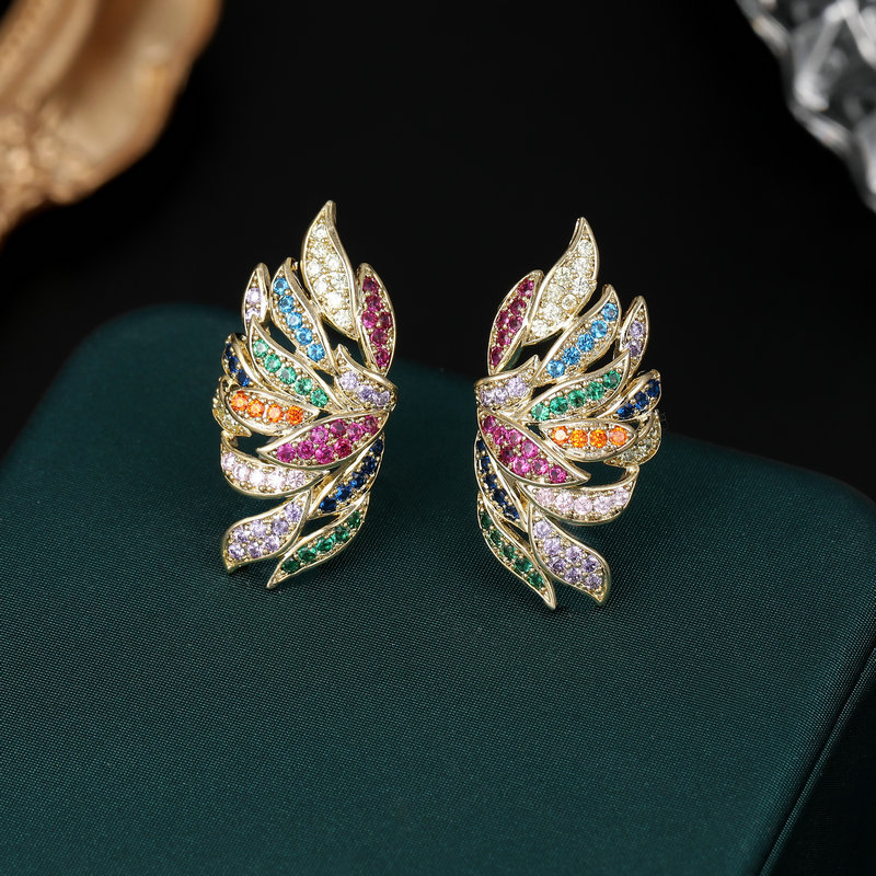 The 2022 new trendy earrings feature a light luxury and fashionable design with zircon inlays, creative feather wings, and no ear piercings or ear bone clips