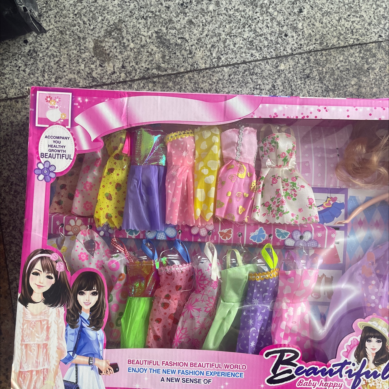 New set of doll accessories and clothes. The doll has a solid body. The hair is loose. Mix the colors of the clothes details Picture