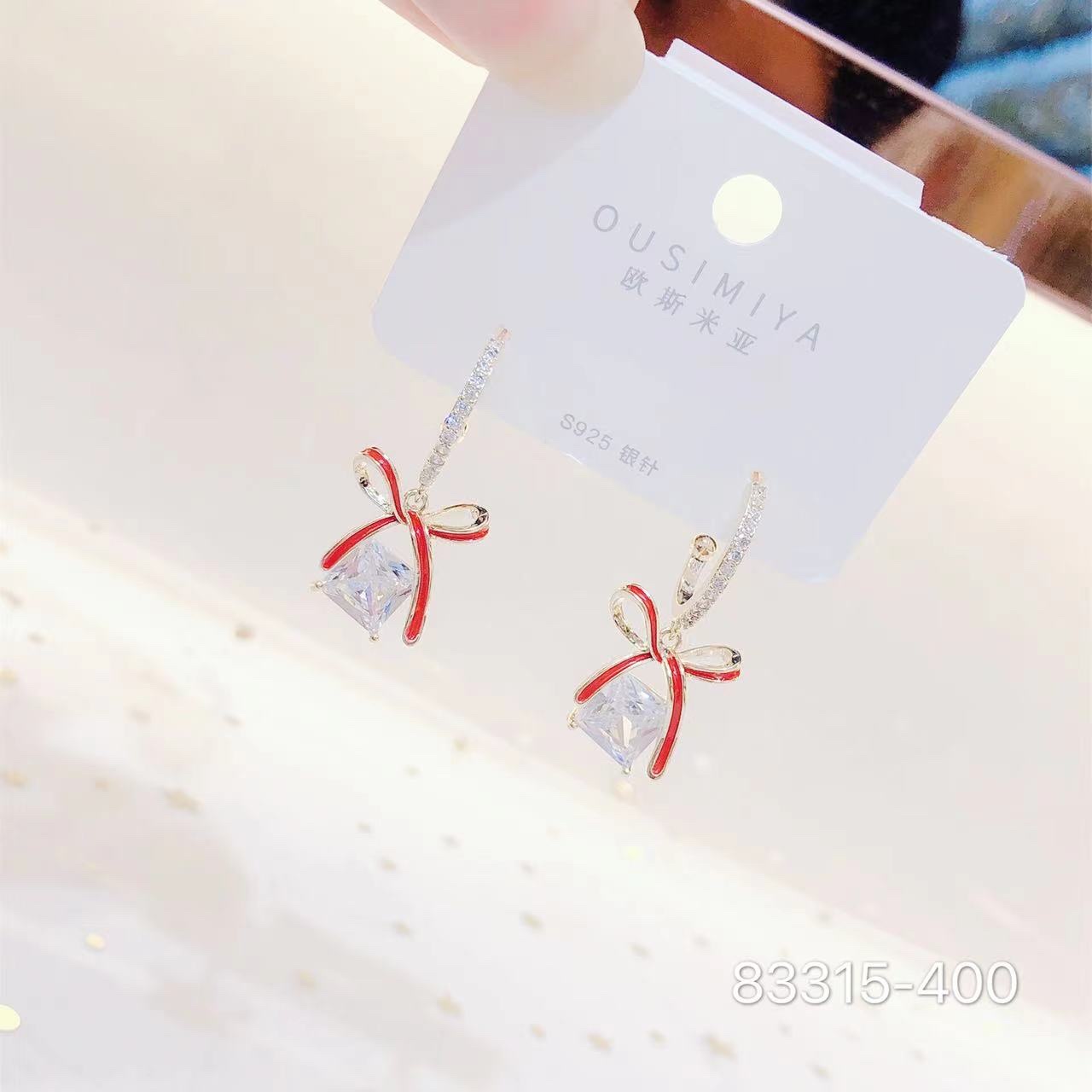 韩版潮流时尚蝴蝶结滴油耳环83315