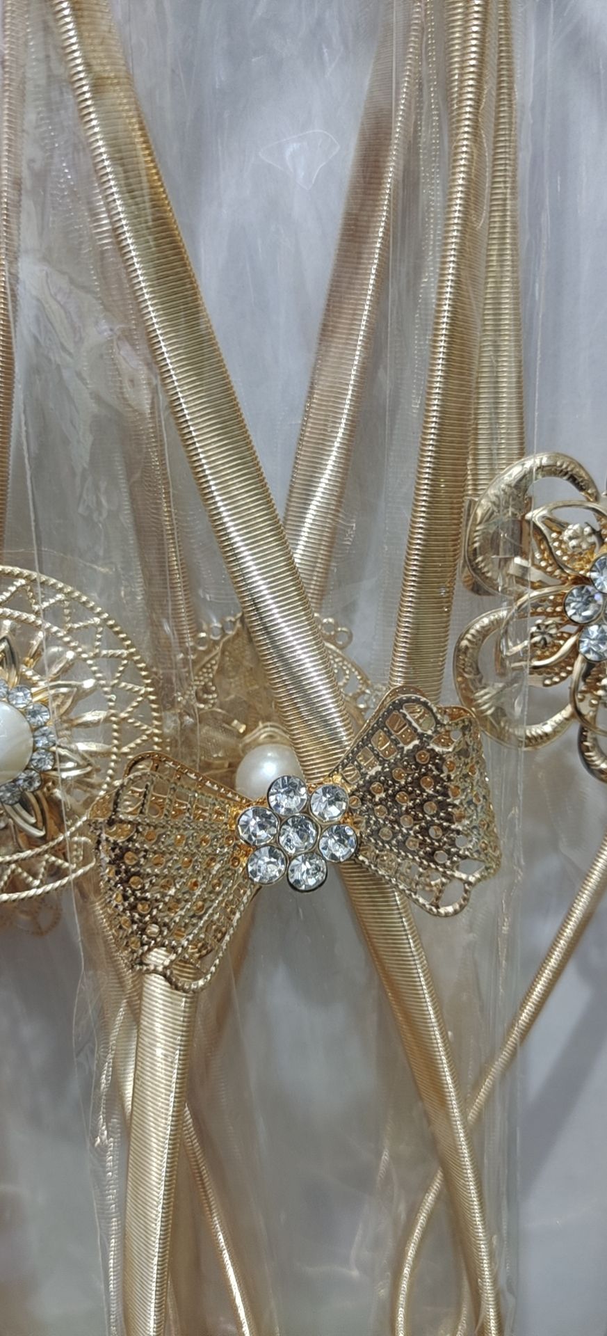 y52, a trendy golden metal rhinestone pearl leaf buckle spring elastic band paired with a thin waist chain belt for pants Specification image
