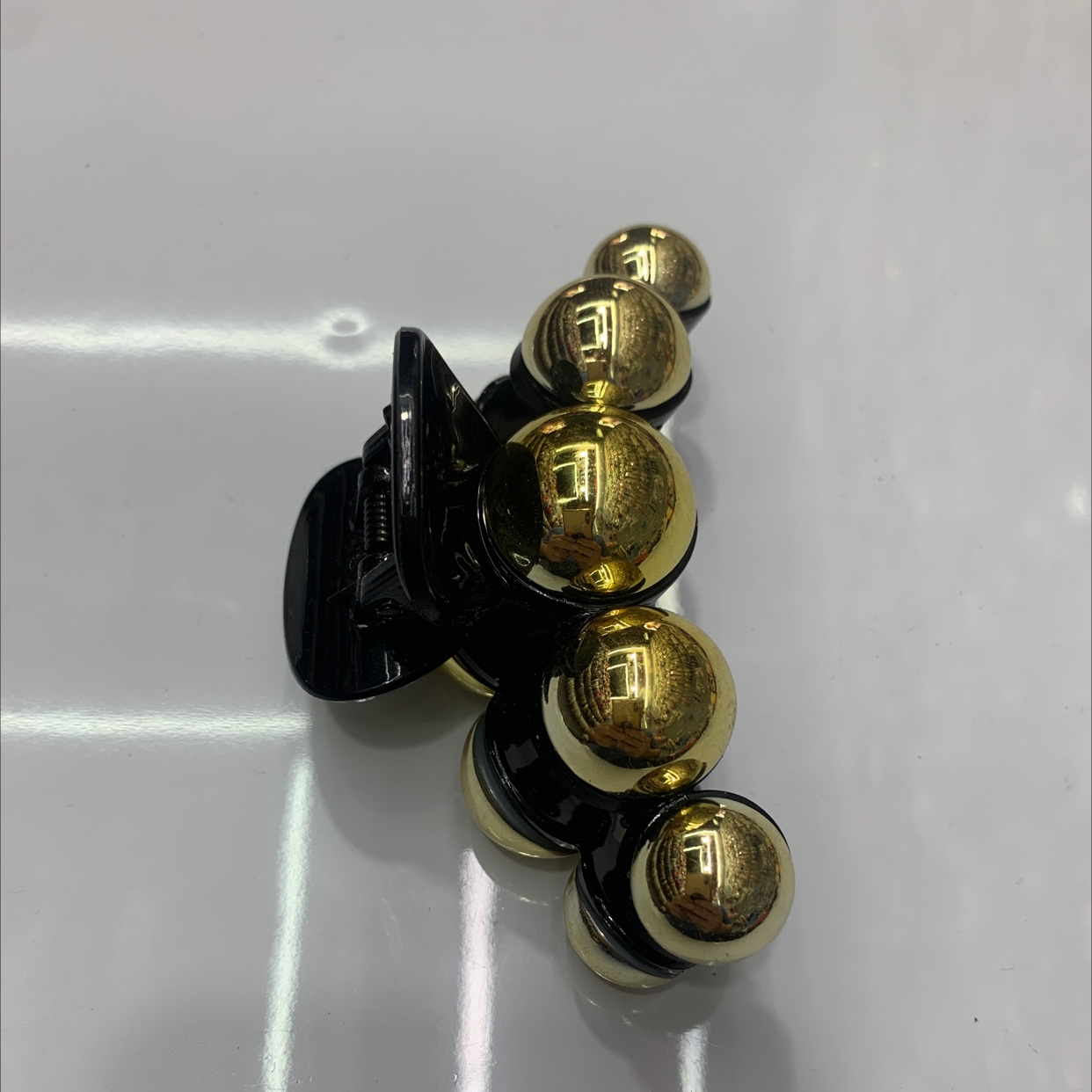 The dazzling golden hairpin is fashionable, trendy and versatile. It's a simple and elegant headwear for ladies, with a gold star accessory