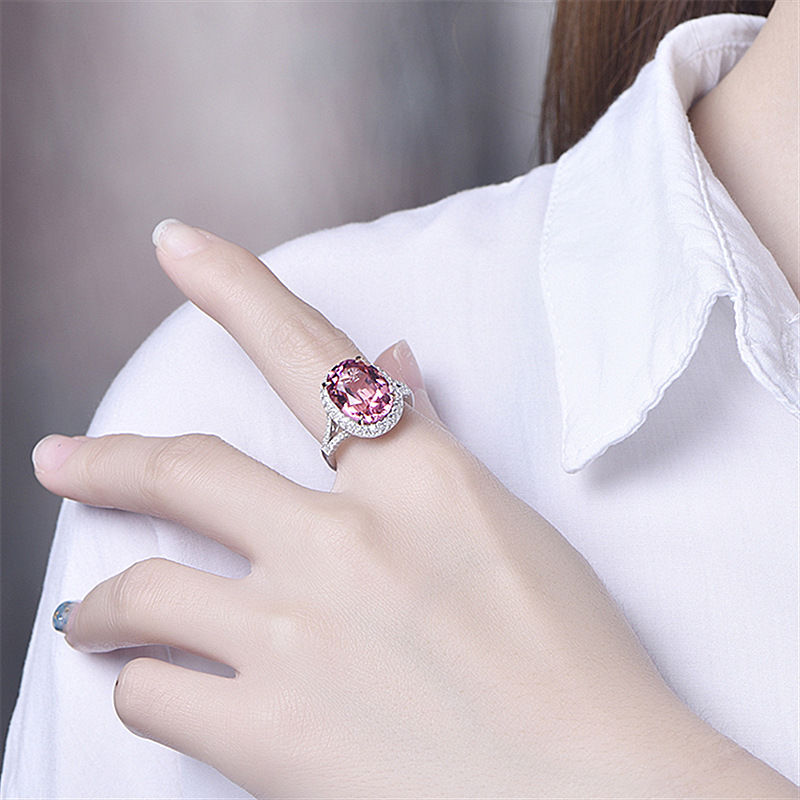A pink zirconium ring set with a large loose diamond and pink diamonds Application Scenario
