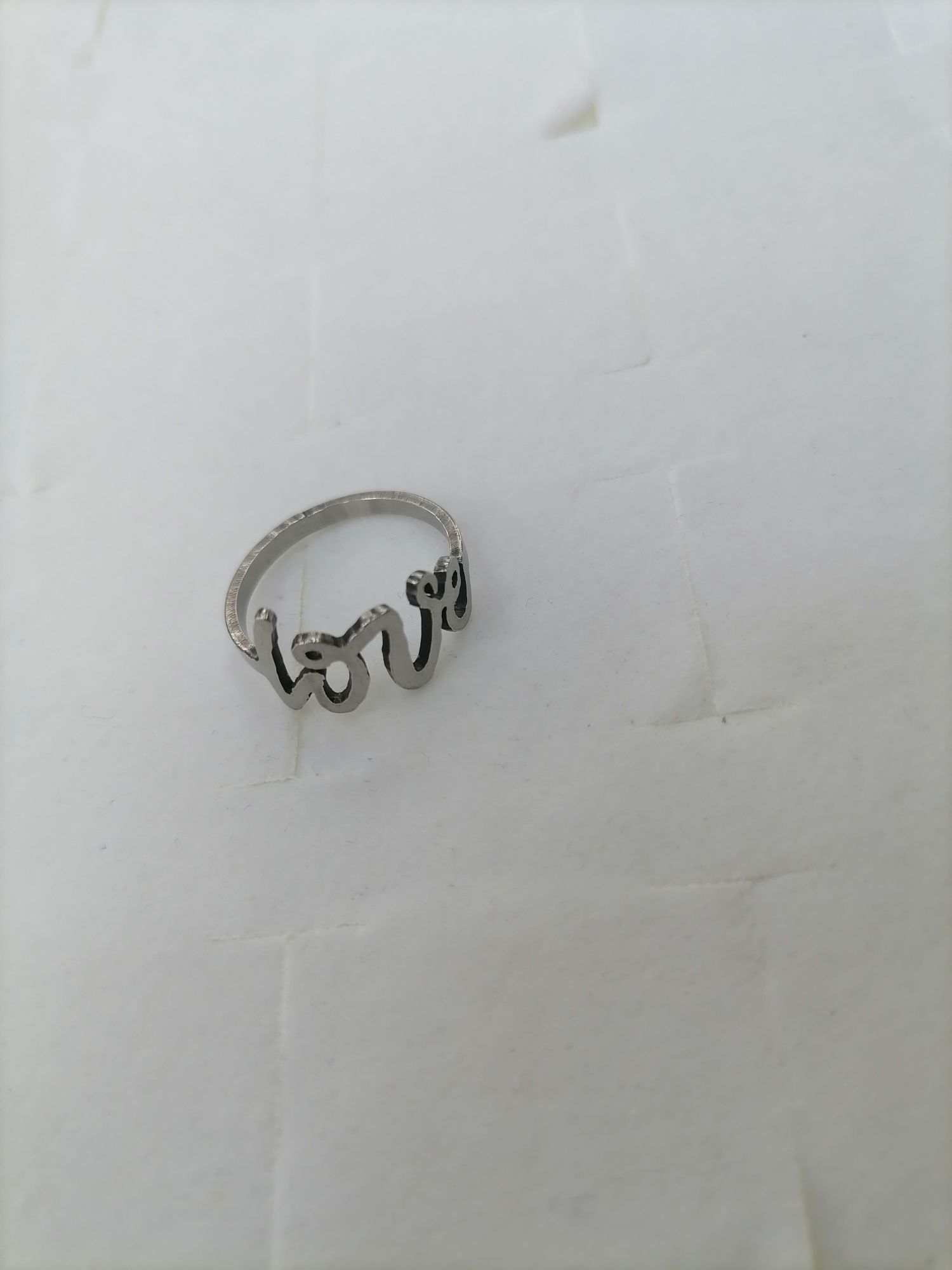 Titanium steel silver hollowed-out LOVE ring, Red Star Jewelry 04-122 Application Scenario