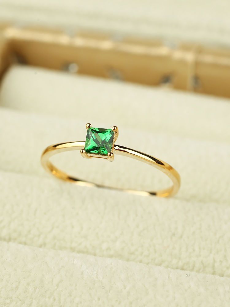 A fashionable square emerald engagement ring slightly studded with diamonds for a simple wedding Specification image