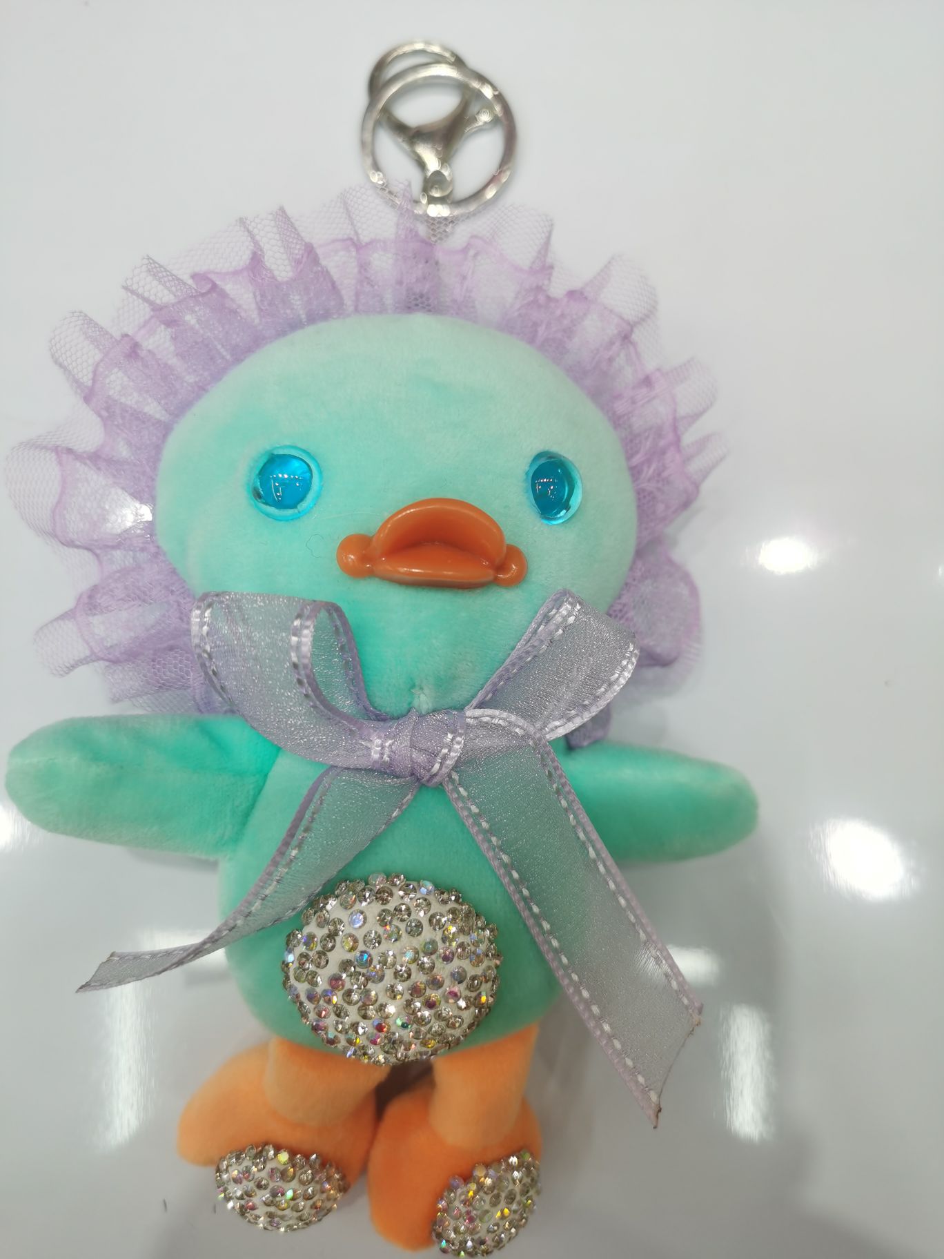 Factory direct sales: 3711 Qilisha Accessories, including various plush balls, pendants, hairballs, and hair hoop headbands. New trendy and cute pet 16cm lace duckbaby keychains with diamonds in two colors