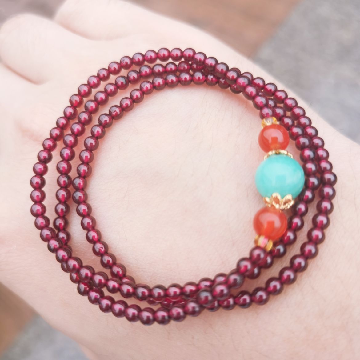 Wrap the garnet around the bracelet three times