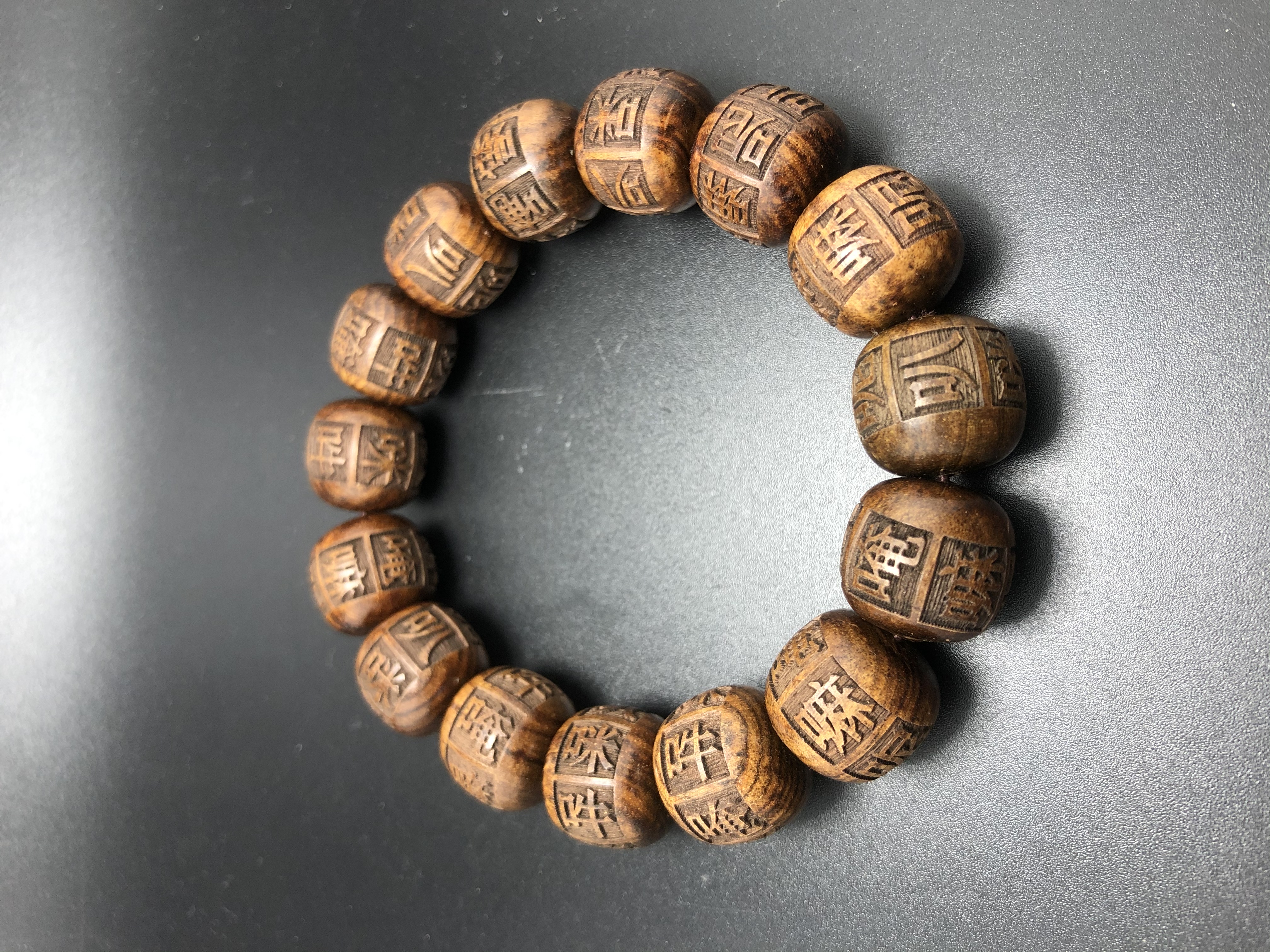 Rosewood fully carved six-character mantra bucket beads 1.5 cultural play Buddhist beads: Store 8091, Zone D, 3rd Floor, Phase I of Yiwu International Trade City details Picture