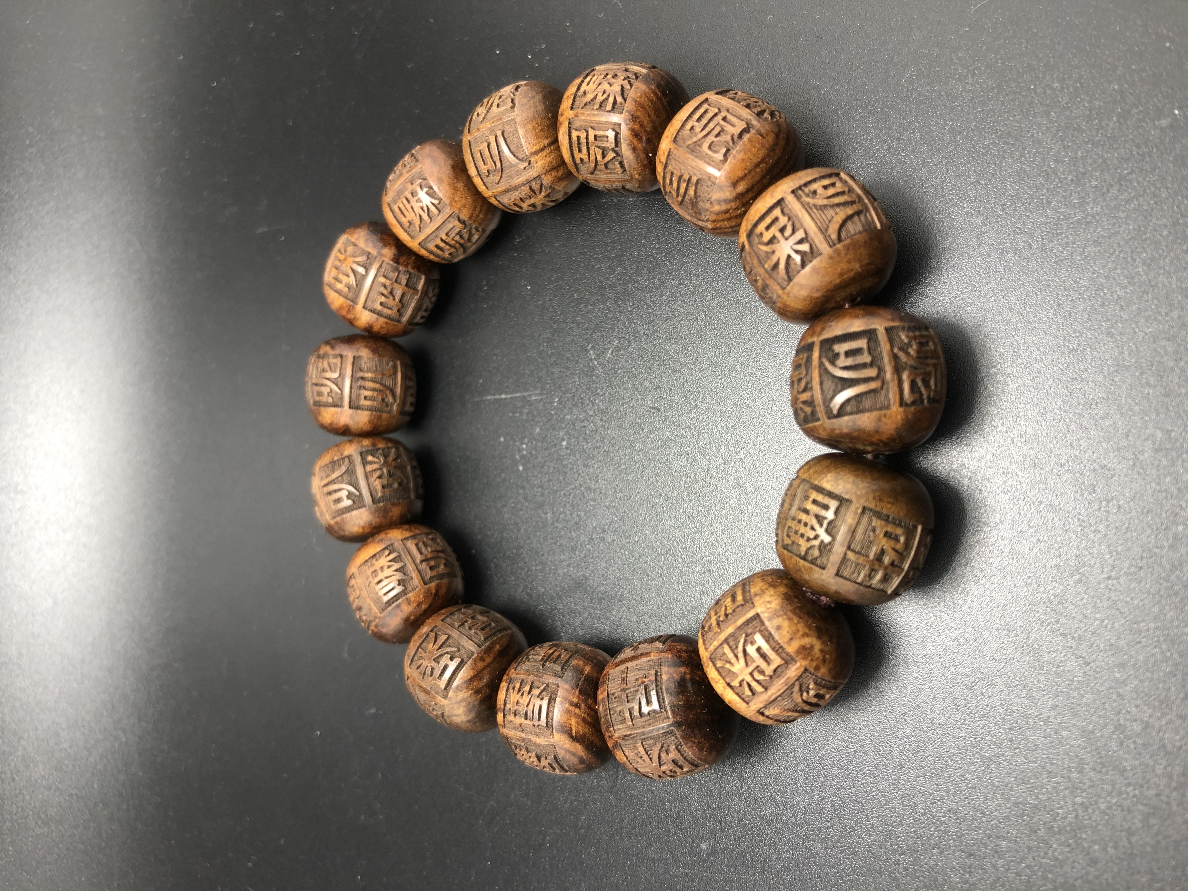 Rosewood fully carved six-character mantra bucket beads 1.5 cultural play Buddhist beads: Store 8091, Zone D, 3rd Floor, Phase I of Yiwu International Trade City Application Scenario