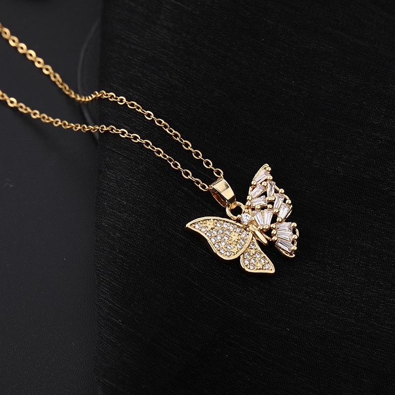 A trendy and individualistic collarbone chain with a unique and Instagno-like style, featuring a colorful trapezoidal zircon star butterfly pendant necklace from Europe and America details Picture