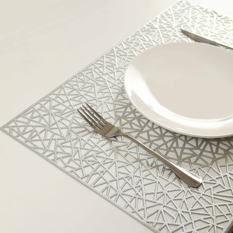 Nordic, Japanese and European style PVC geometric gilded hollowed-out home dining plates, heat-insulating Western dining bowls, table coasters and placemats details Picture