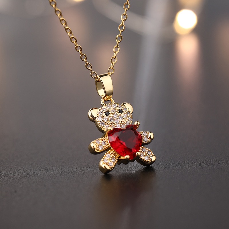 Cross-border supply: Hot-selling copper micro-inlaid zircon jewelry from Europe and America, cute heart-shaped bear pendant necklace, versatile collarbone chain details Picture