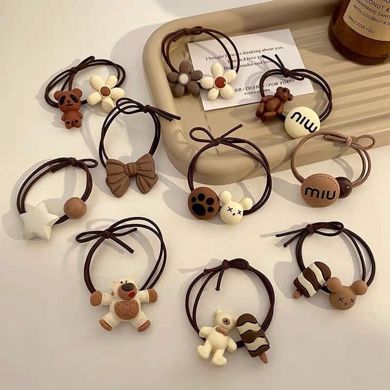 Emilia Pearl Hair Tie for Women, Korean imported simple and elegant five-pointed star hair tie tied into a bun, elastic band, popular Instagram hair accessory 020 Application Scenario