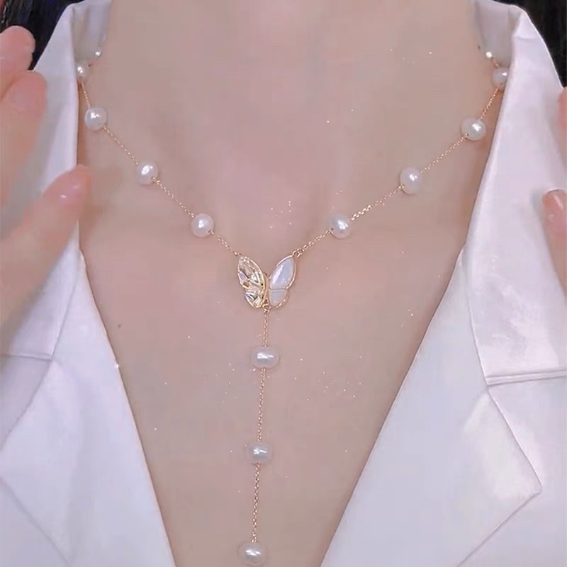夏季珍珠流行蝴蝶项链女小众设计高级感长款流苏不对称贝壳吊坠颈链