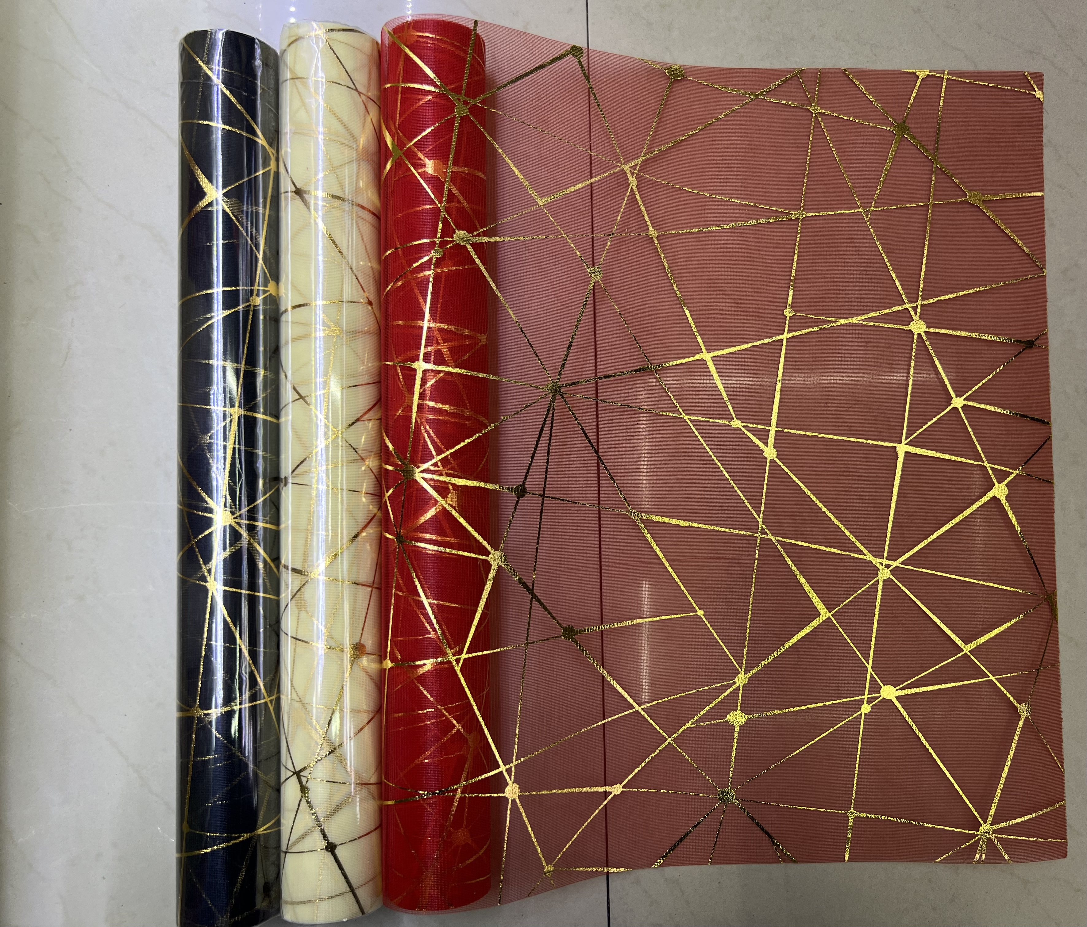 The mesh is gold-embossed in multiple colors