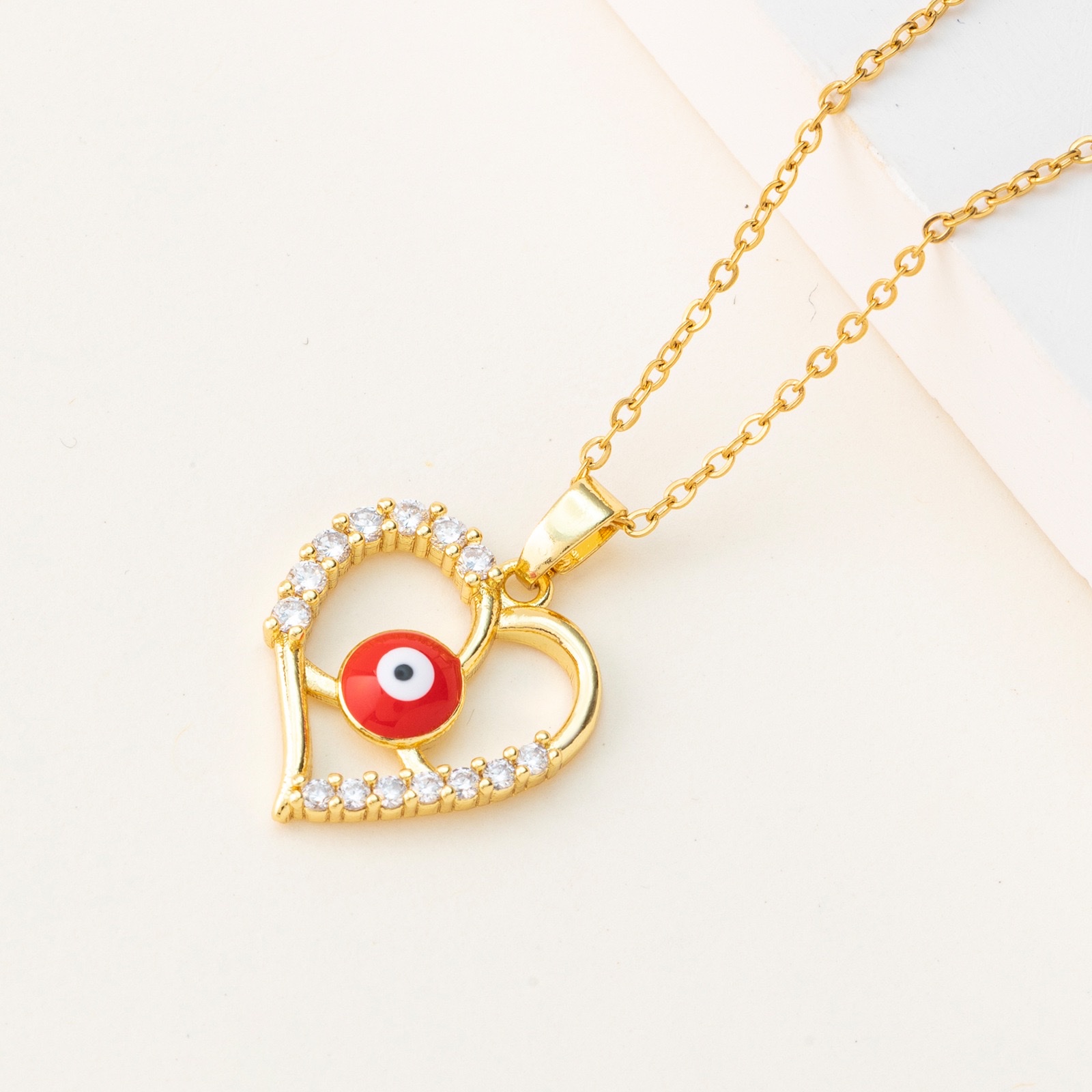 European and American cross-border evil eye necklace, zircon pendant, stainless steel necklace, oil-drip, brass plated with fashionable gold collarbone chain Specification image