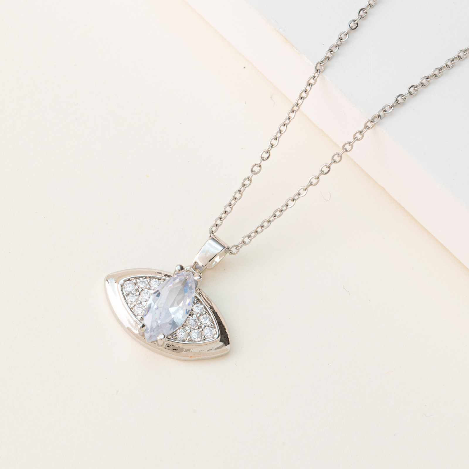 A popular cross-border bestseller in Europe and America: Evil eye pendant necklace, titanium steel collarbone chain, copper-plated 18K gold fashionable sweater chain details Picture