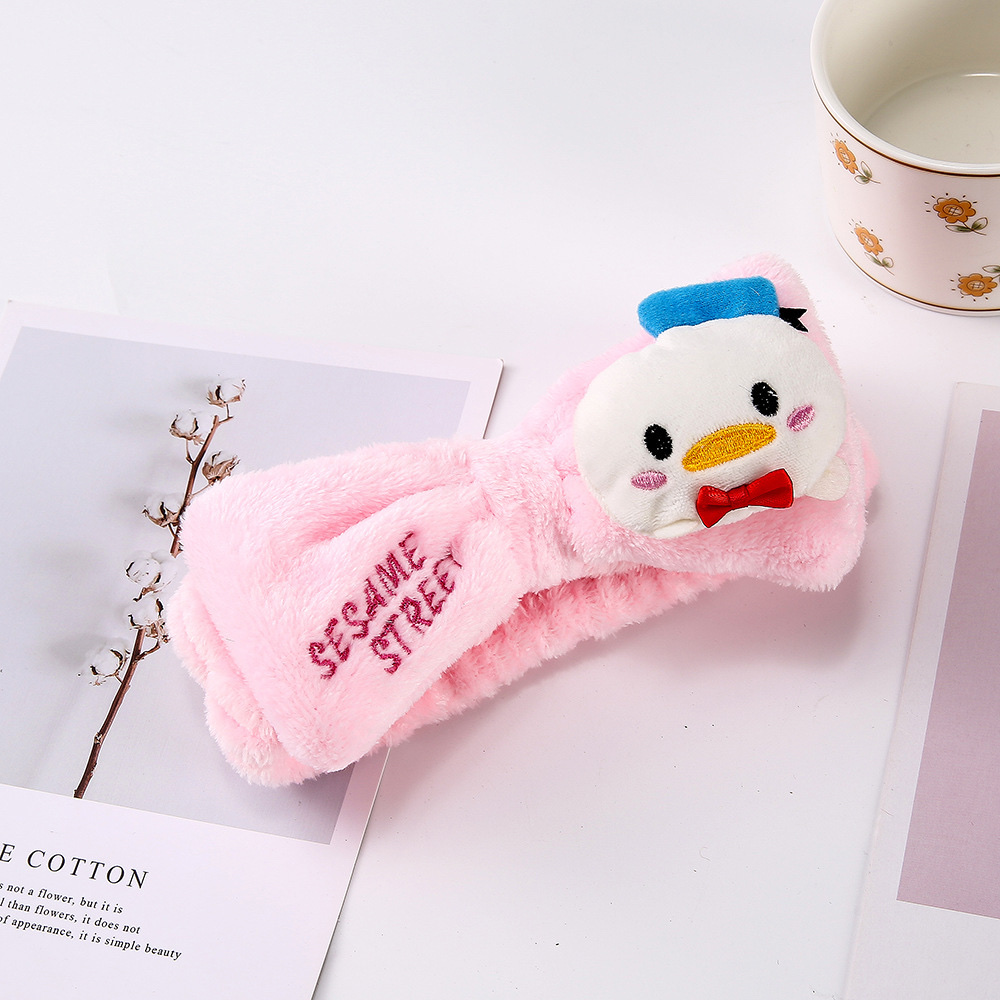 日韩可爱卡通网红时尚蝴蝶结唐老鸭头带女化妆洗脸字母法兰绒发带优优饰品