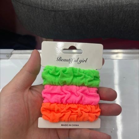 Three pieces of cardstock, large jacquard towel ring, in color