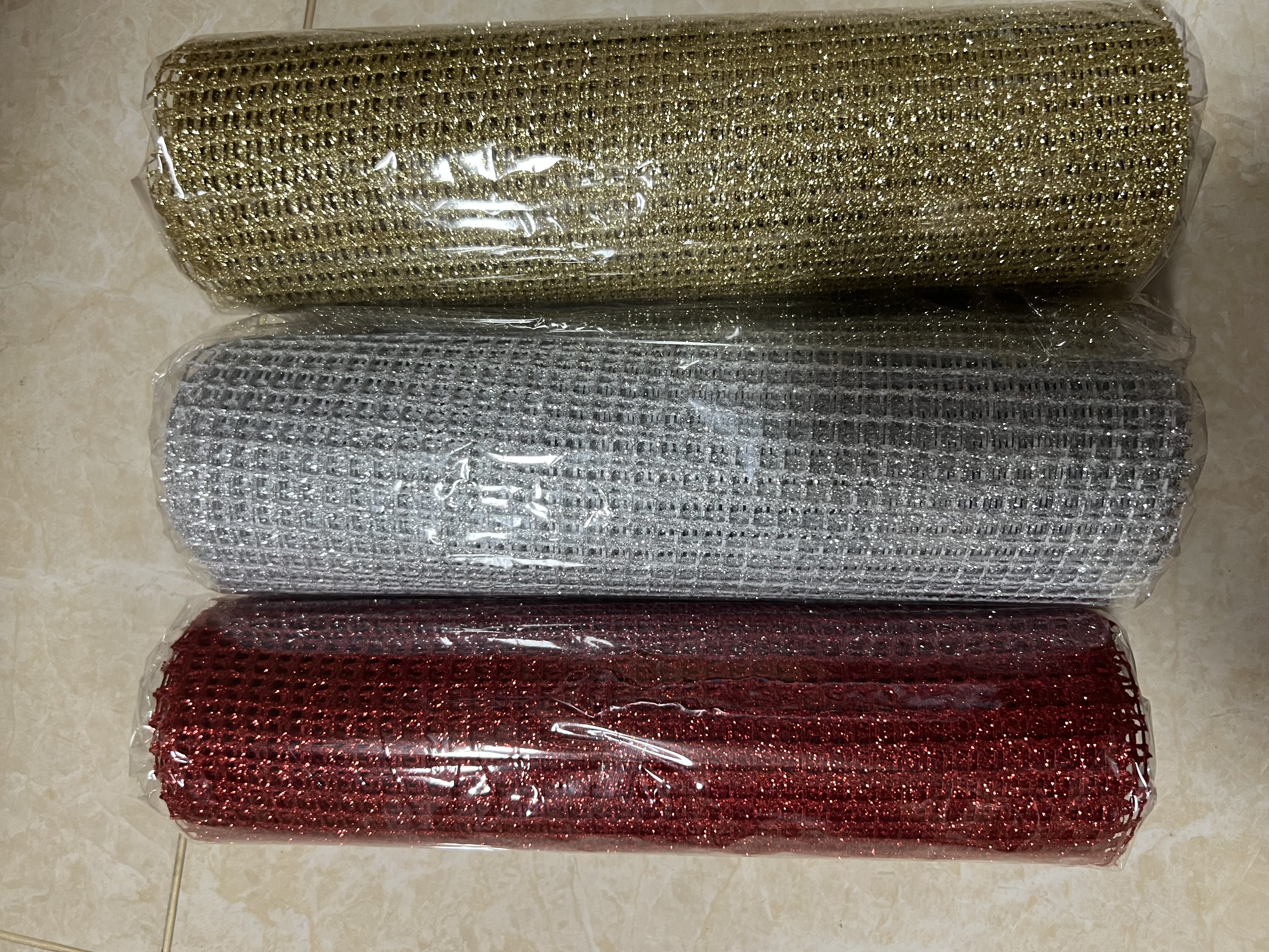 The coarse grid net is covered with powder