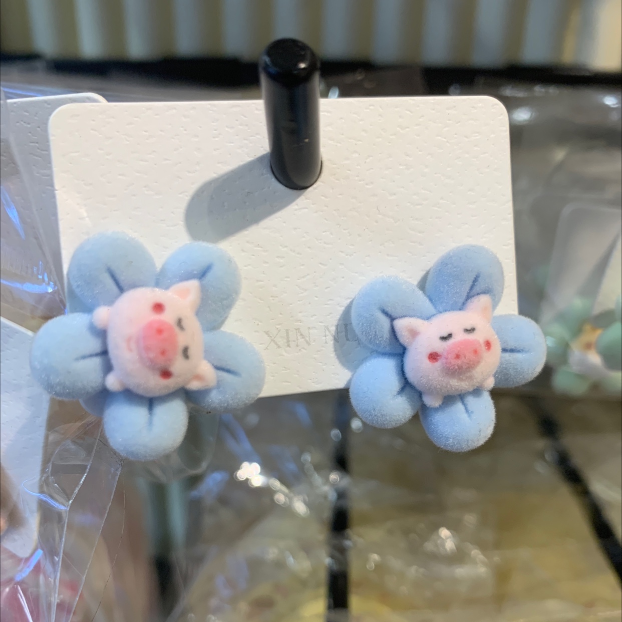 Flocking pig ear studs