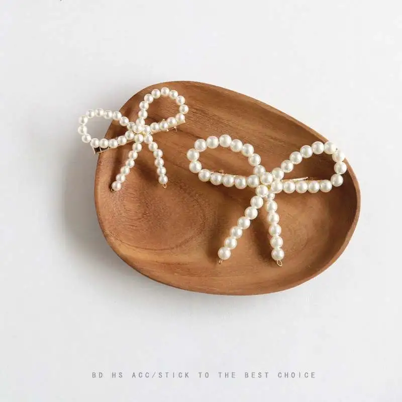 韩国蝴蝶结珍珠发夹发饰甜美ins网红边夹一字刘海夹发卡头饰卡子图