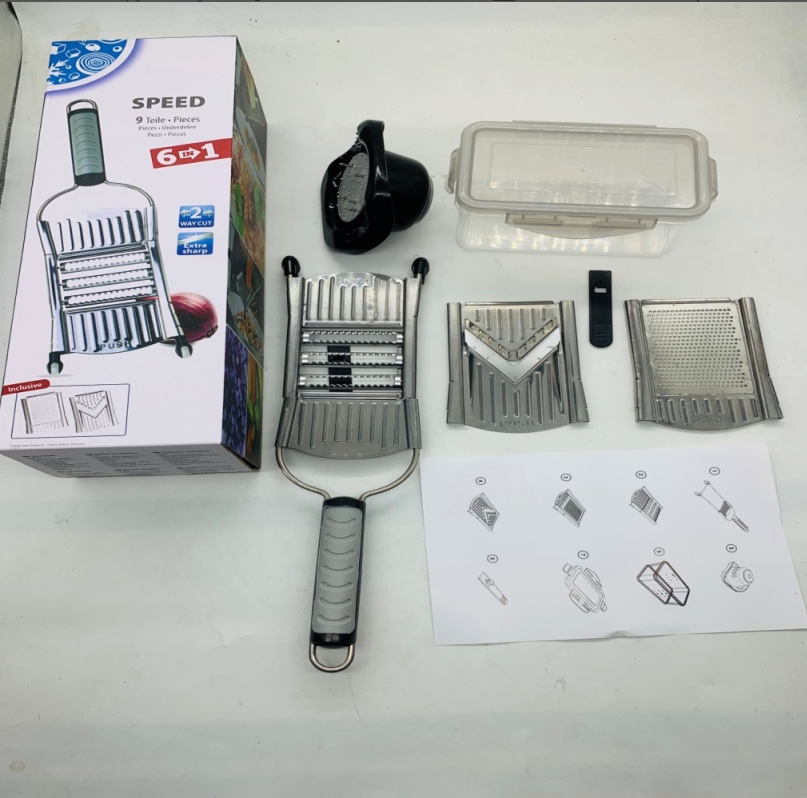 A three-in-one grater and stainless steel slicer with three interchangeable blades Specification image