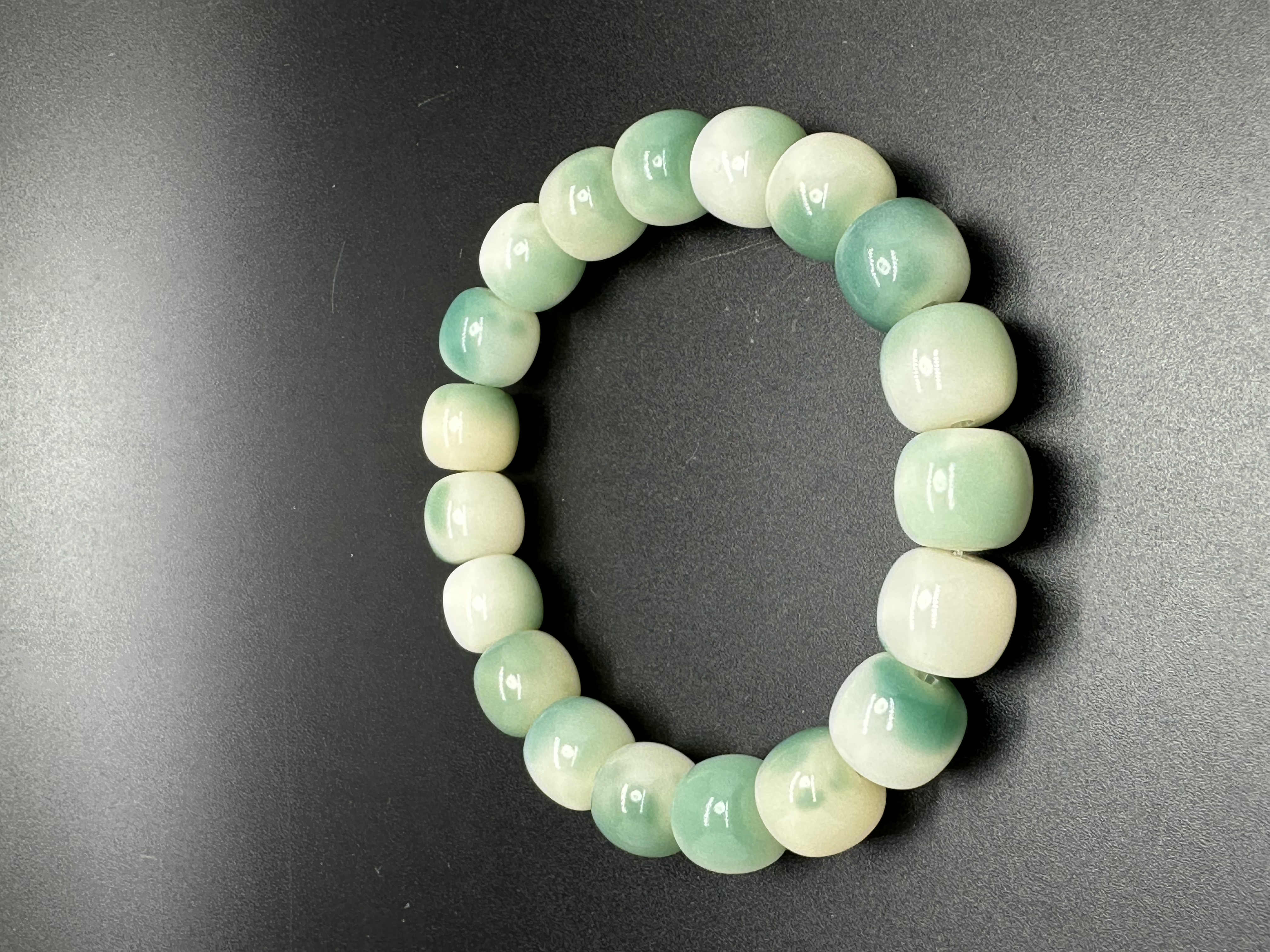Ink flower-patterned white jade Bodhi plate playing hand beads: 8091 Xiangyuan Buddhist Beads, Zone D, 3rd Floor, Phase I of Yiwu International Trade City Specification image