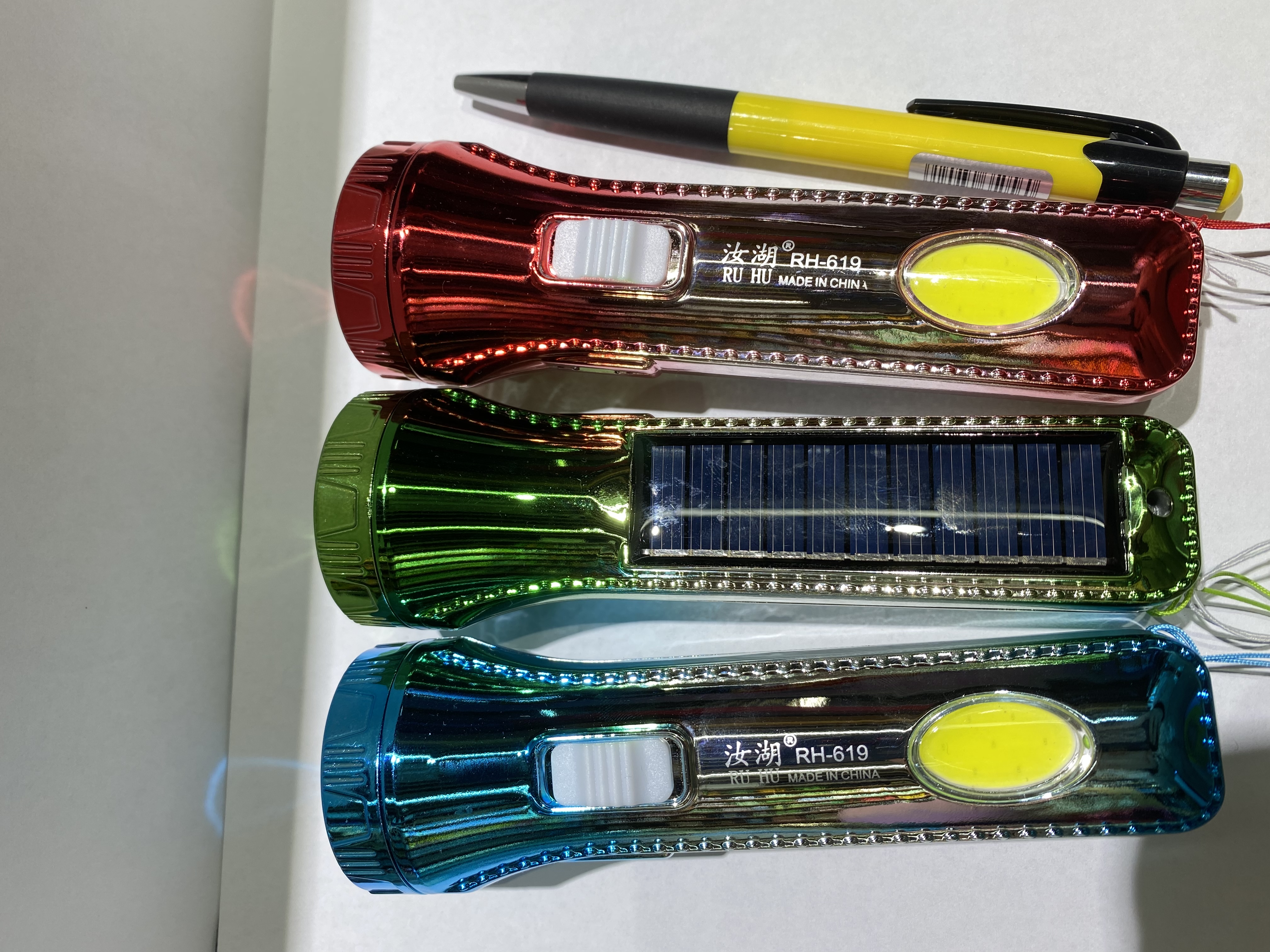 太阳能手电筒UV混色太阳能充电手电筒太阳能手电筒充电手电筒混色UV混色太阳能手电筒图