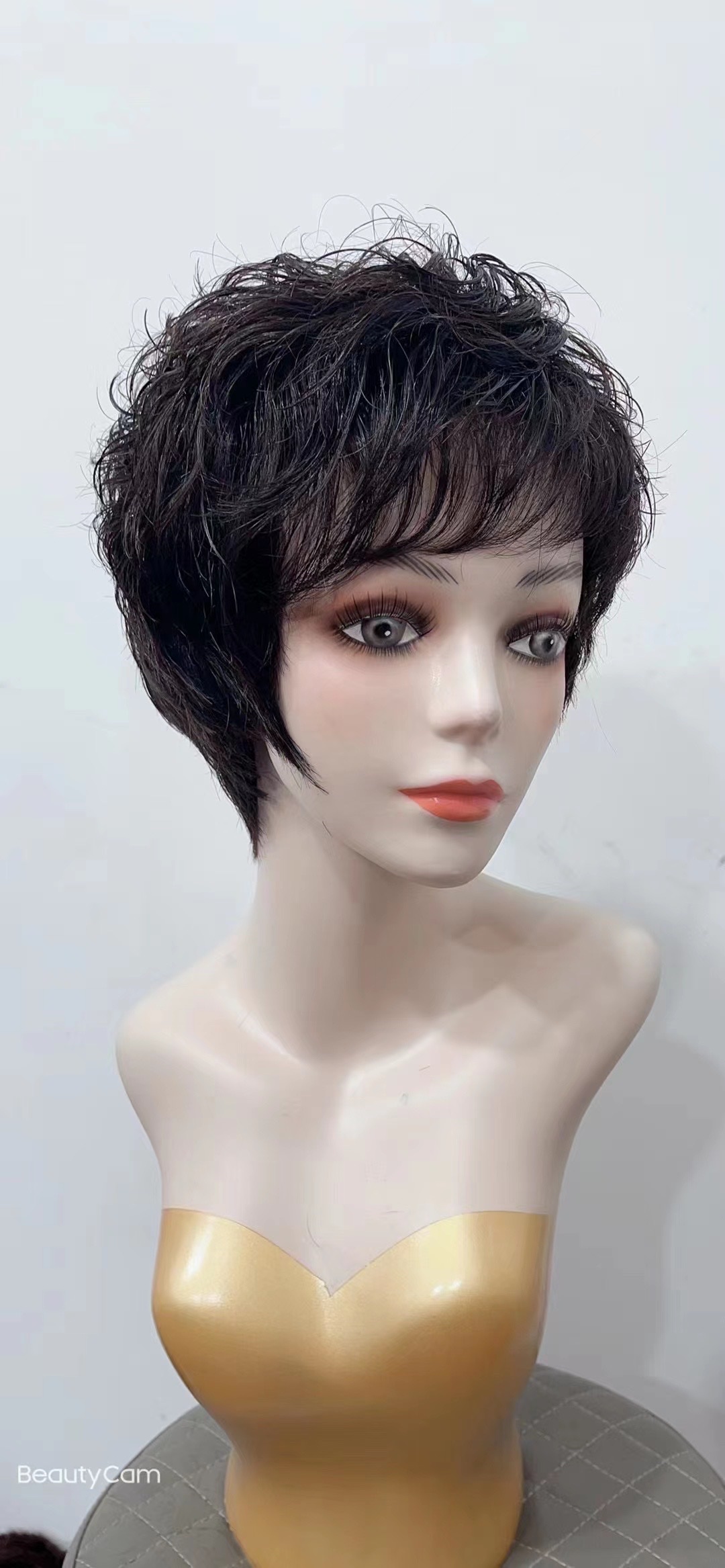 A wig for women with short hair, a Bob hairstyle, a round face with a straight fringe, and a natural and realistic wig. It's a full straight hair and a full head cover details Picture