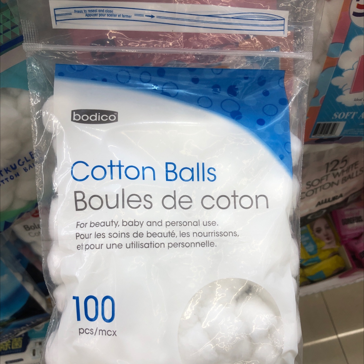 One hundred white cotton balls