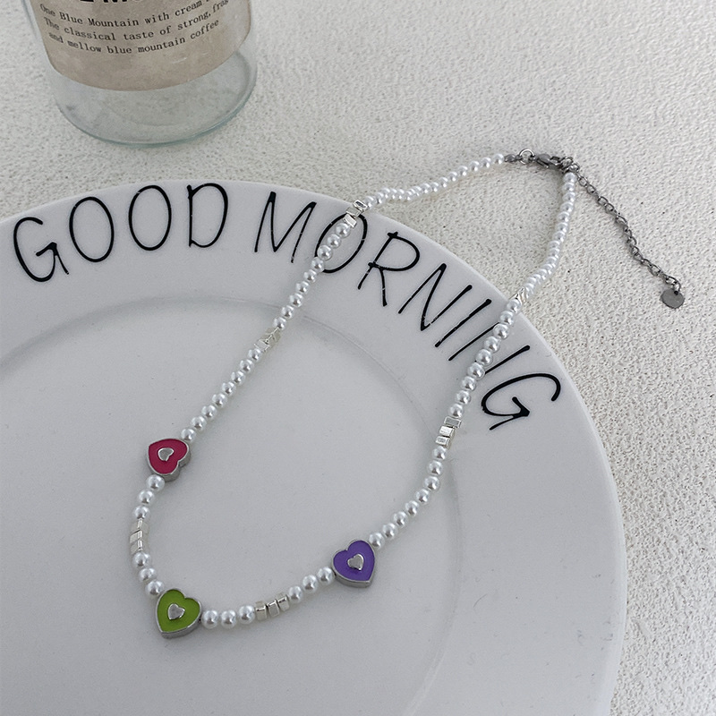 Candy-colored heart-shaped pearl necklace for women, exquisite and versatile. A small silver patchwork collarbone chain, a niche, simple and high-end necklace Application Scenario
