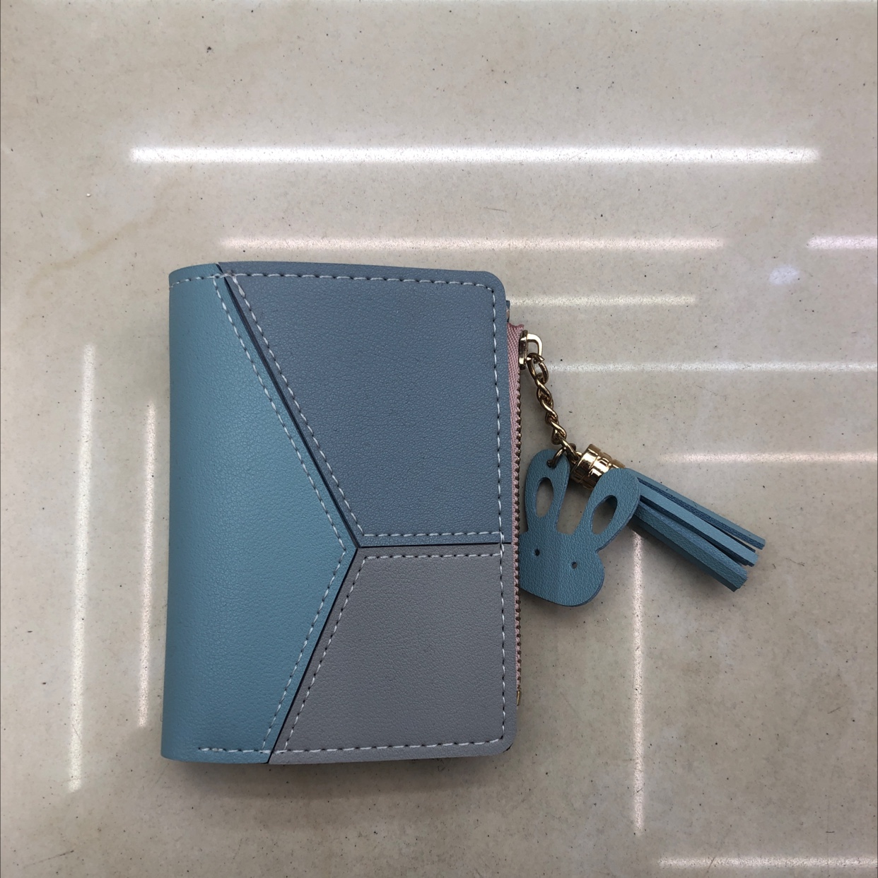 Storage Compartments of the Three-Color Spliced Bunny Pendant Short Purse