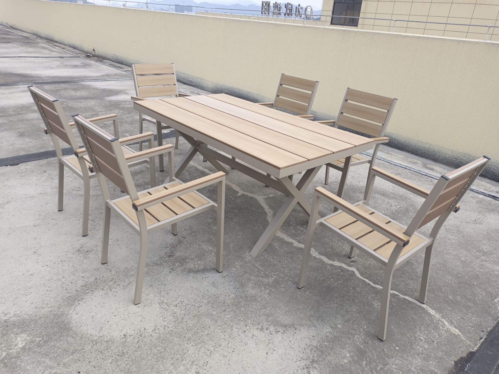 JHA-5553B outdoor wood-plastic tables and chairs, 6 chairs and 1 table, made of aluminum teak in yellow color Application Scenario