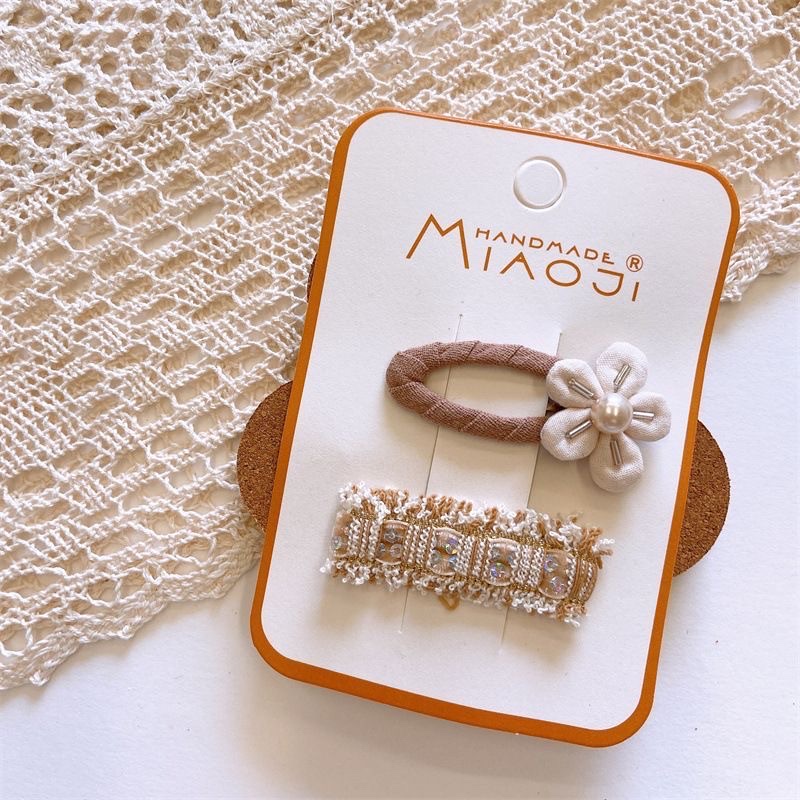 Korean early autumn sweet milk coffee bow hair clips, children's fabric BB clips, cute 5-petal flower-filled cotton girls' hair strings Item Picture