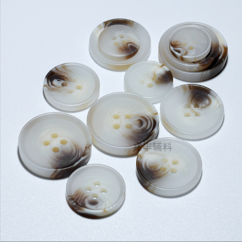 花纹纽扣/树脂纽扣/大衣风衣纽扣白底实物图