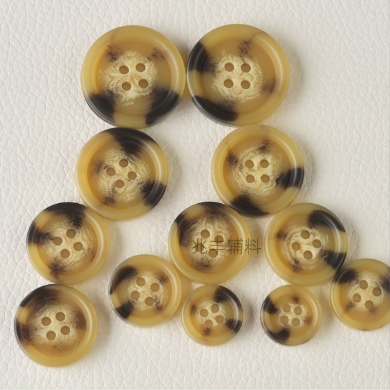 Four-eye round-edge round-bottom resin buttons, windbreaker buttons, matte buttons, manufacturer in stock, overcoat buttons, suit and trousers buttons Application Scenario