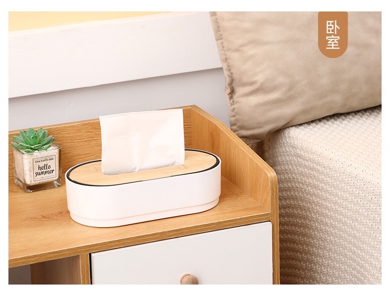 Simple bamboo and wood desktop napkin tissue box, home living room coffee table, height-adjustable creative oval plastic tissue box Application Scenario