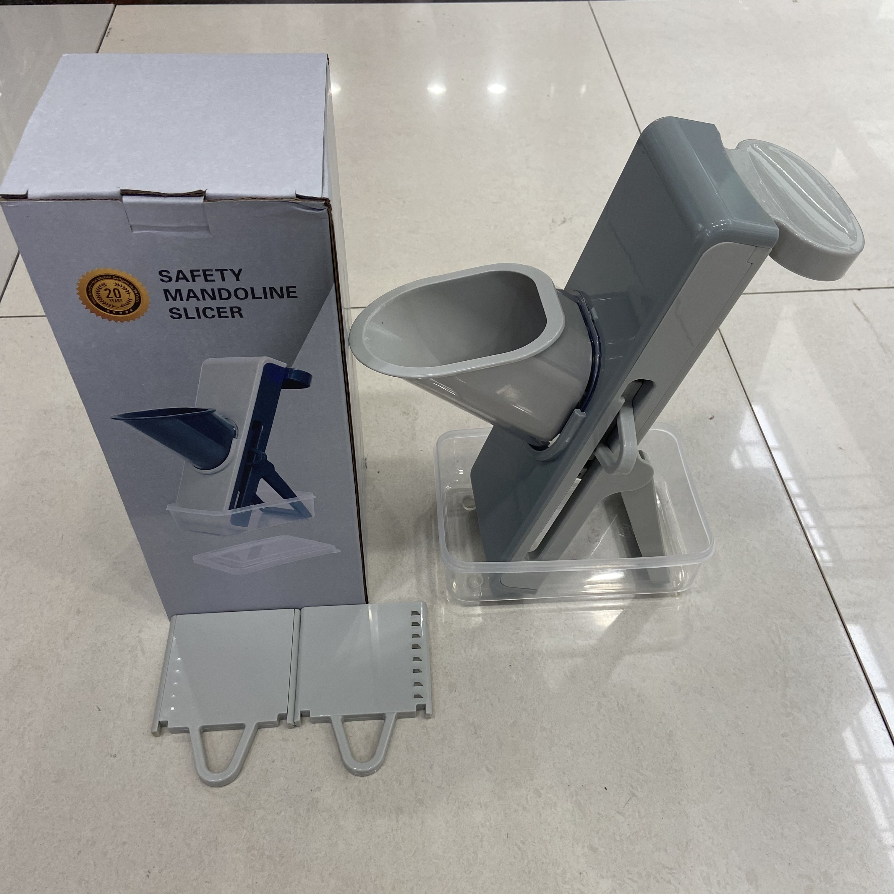 A household kitchen stainless steel hand-friendly fruit and vegetable shredder, slicer, and multi-functional vegetable cutter with adjustable function