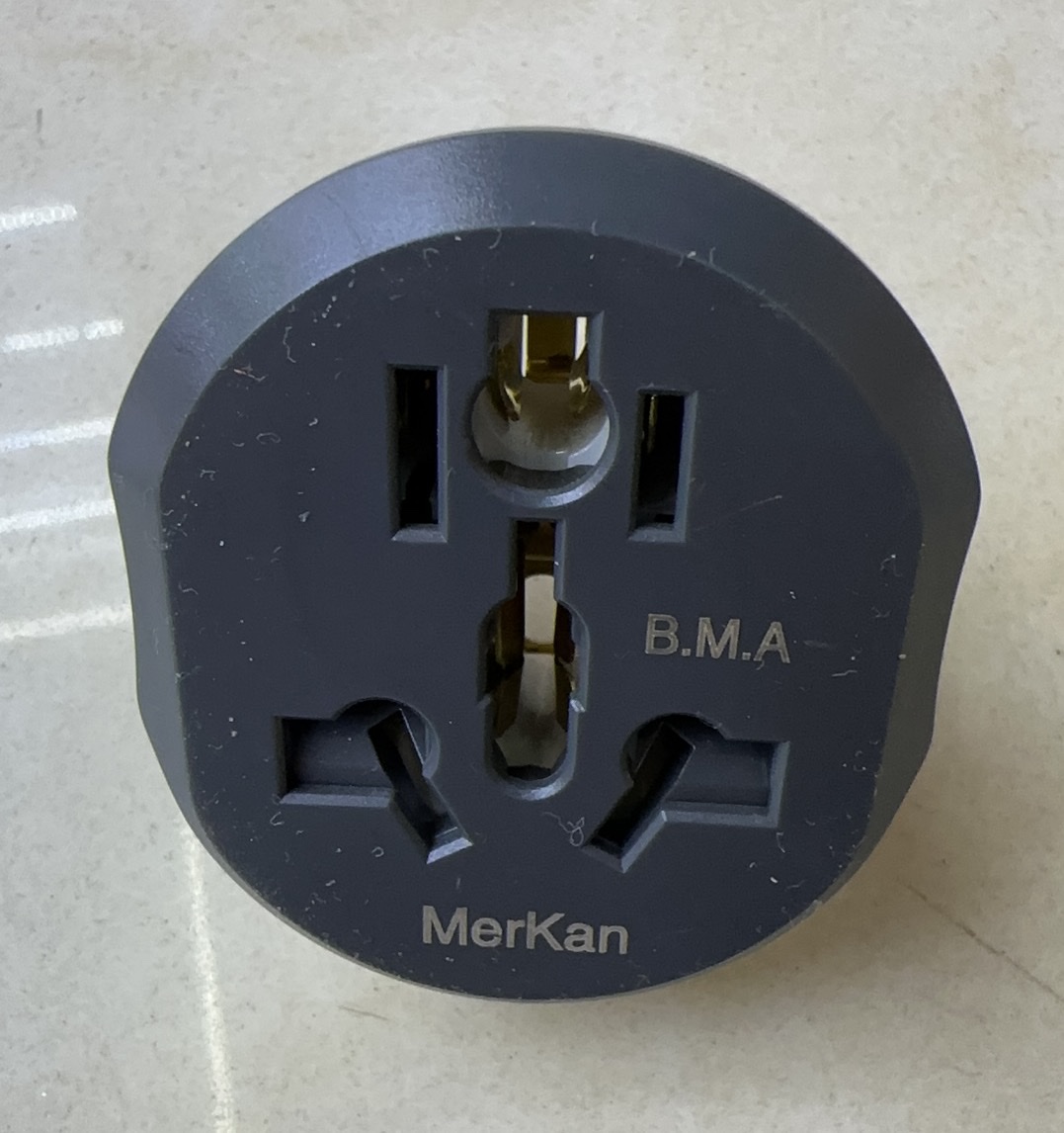 Close-up cross-section illustration of a standard electrical plug showing internal components