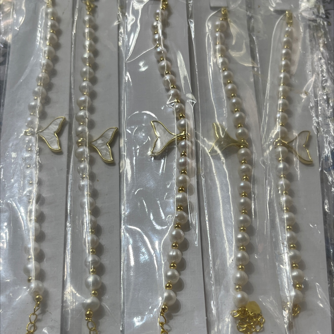 新款5-6mm冲头人鱼贝手链