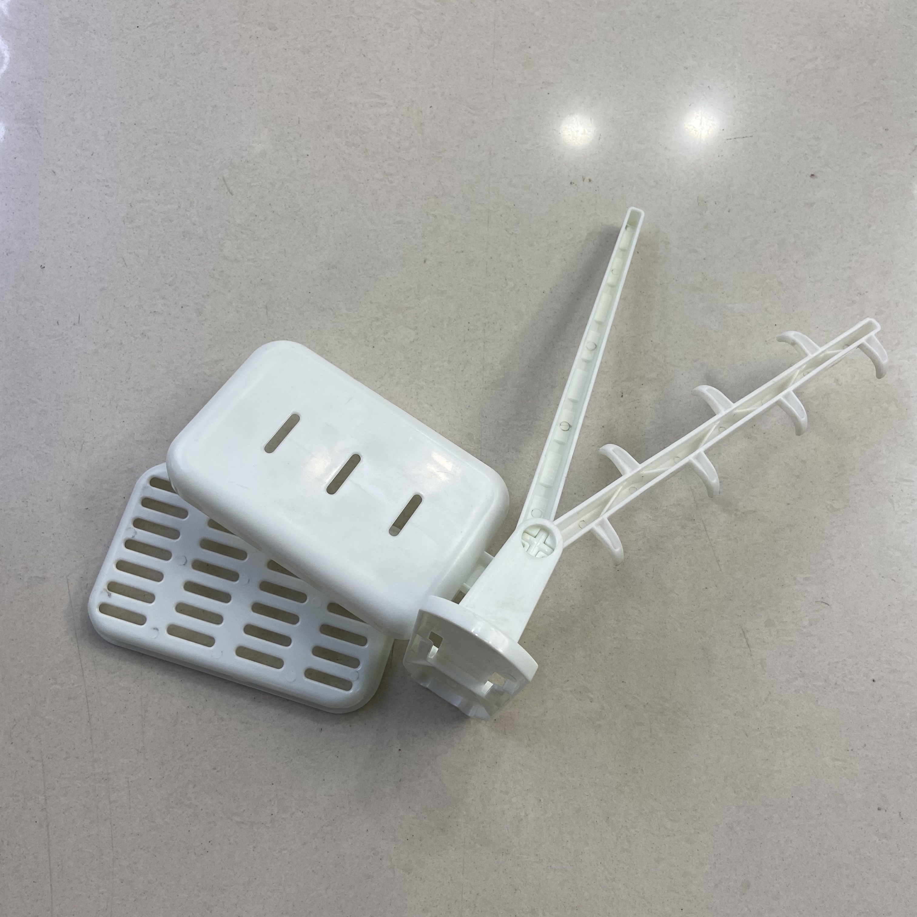 Kitchen and bathroom rotating storage rack, kitchen foldable storage rack, non-drilling wall-mounted hook, bathroom storage rack Application Scenario