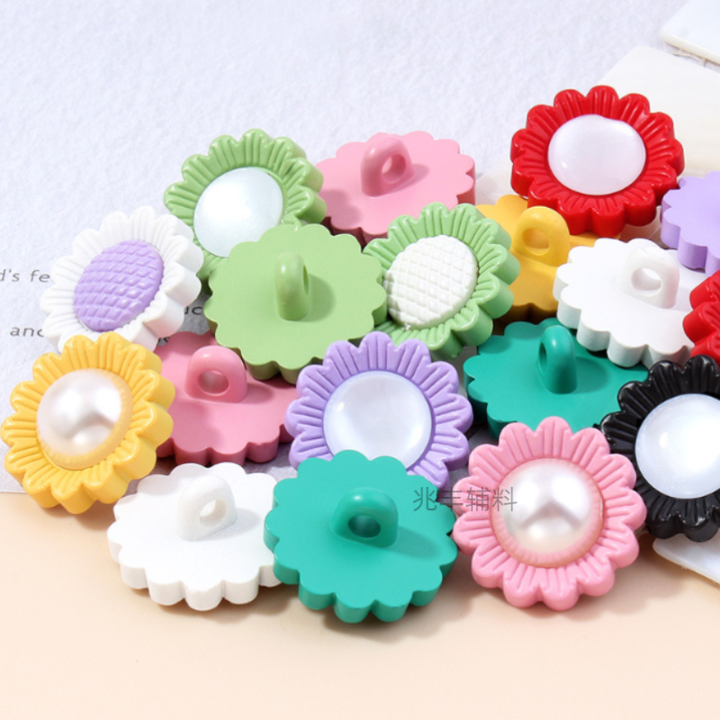 太阳花纽扣/儿童花朵扣子/儿童衣服纽扣白底实物图
