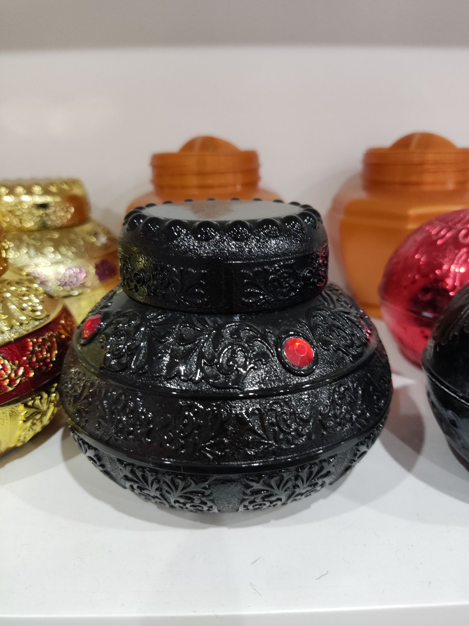 Middle Eastern perfume bottles and cream bottles details Picture