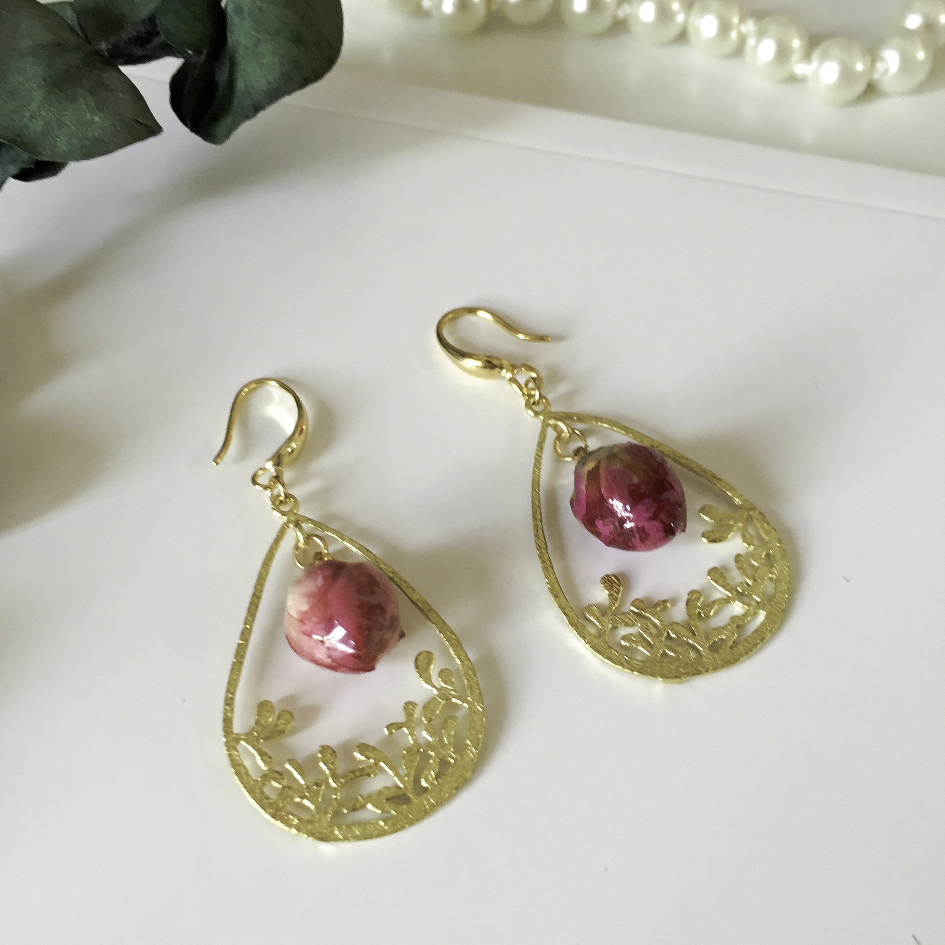 The golden hollowed-out carved rose earrings are adorned with retro and exquisite rose buds, exuding an elegant and courtly charm pic 6