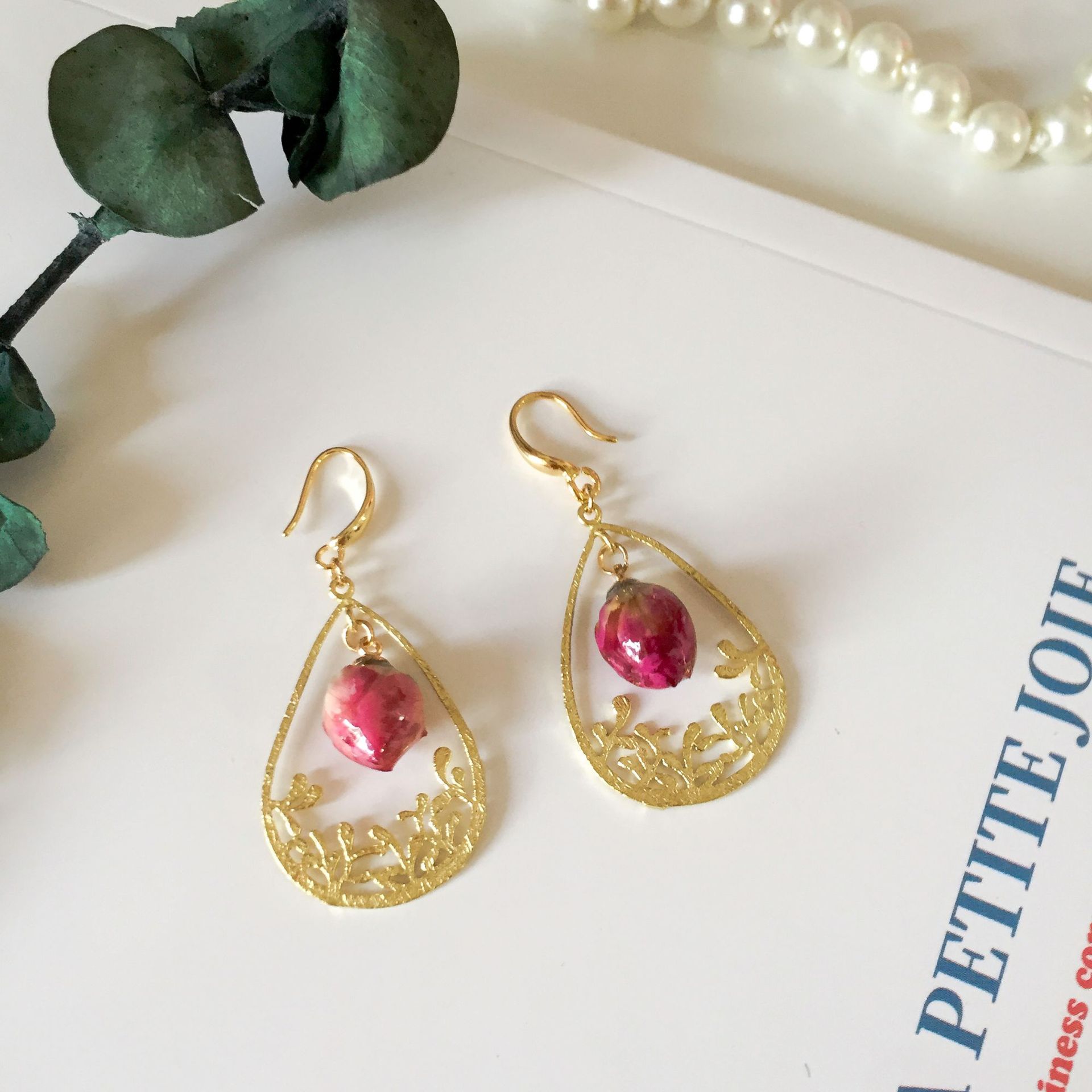The golden hollowed-out carved rose earrings are adorned with retro and exquisite rose buds, exuding an elegant and courtly charm pic 4