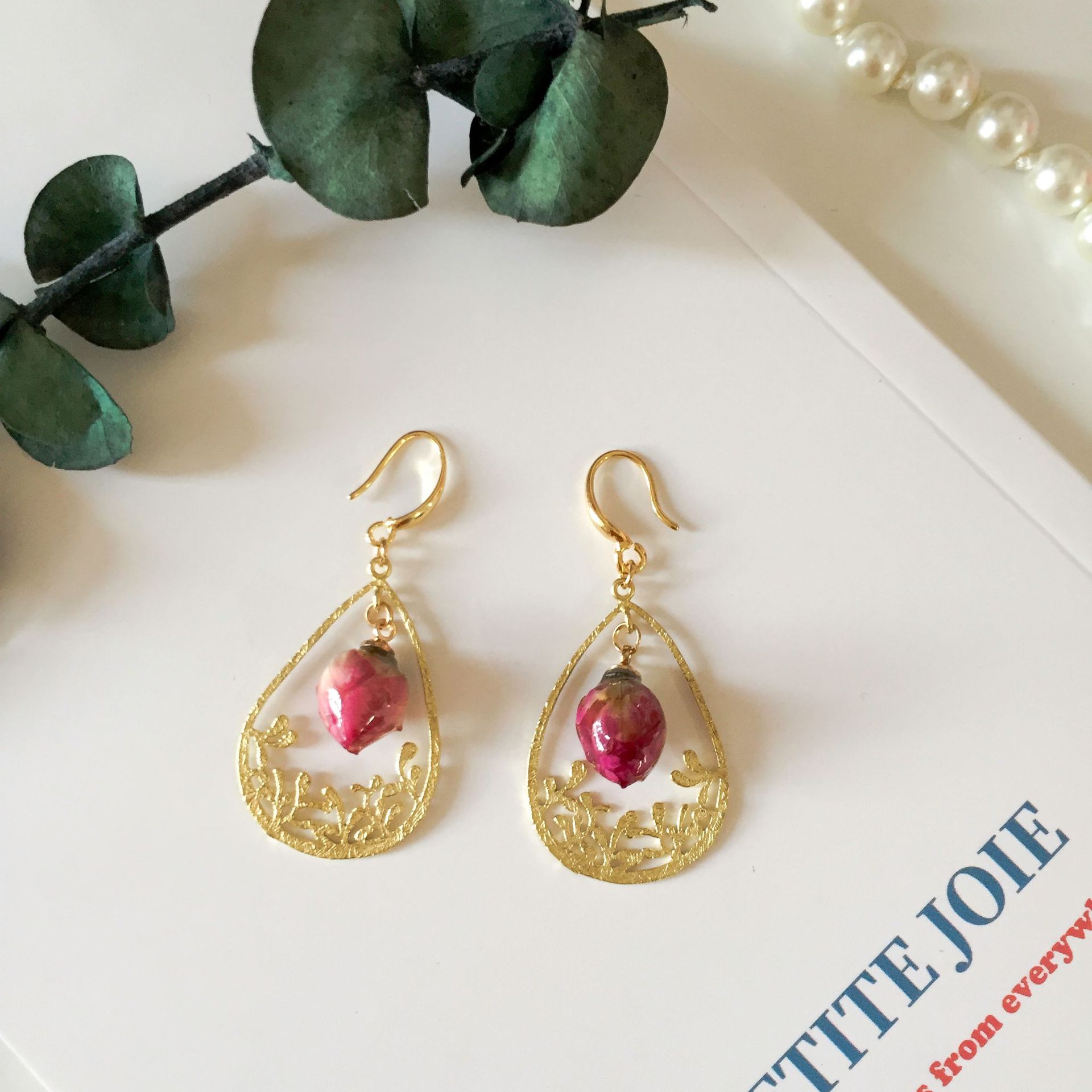 The golden hollowed-out carved rose earrings are adorned with retro and exquisite rose buds, exuding an elegant and courtly charm pic 5